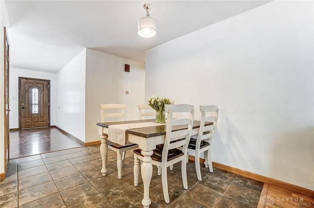 dining room with baseboards