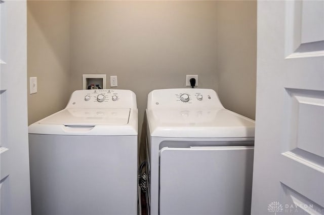 laundry area featuring washing machine and dryer and laundry area