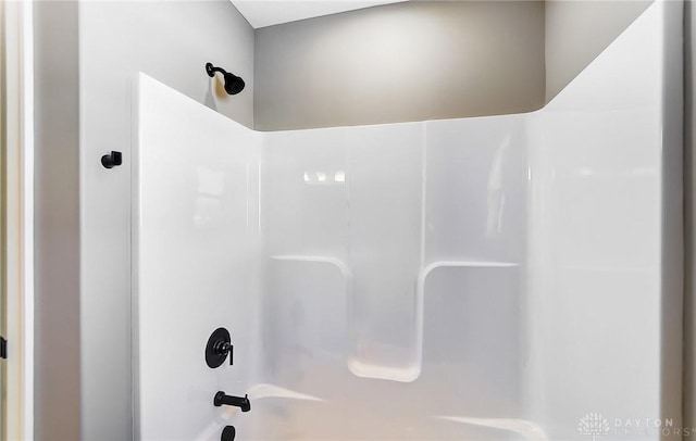 bathroom with shower / tub combination