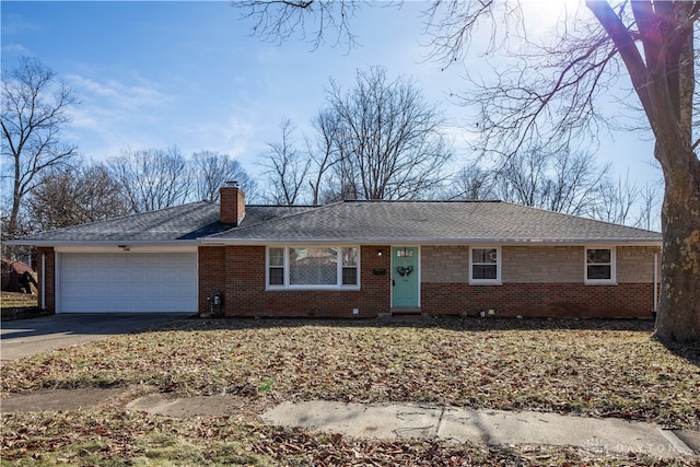 single story home with a garage, driveway, brick siding, and a chimney