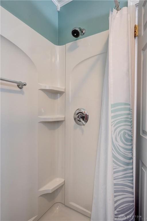 bathroom featuring a shower with curtain