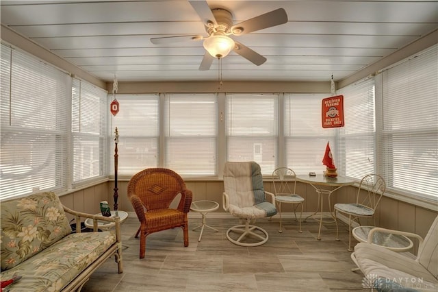 sunroom with a ceiling fan