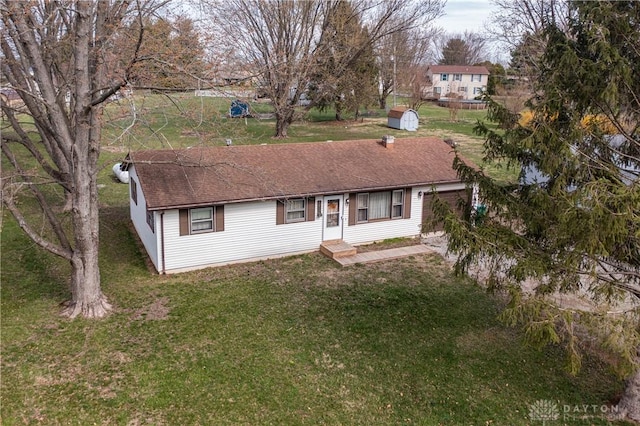 ranch-style home with a front yard
