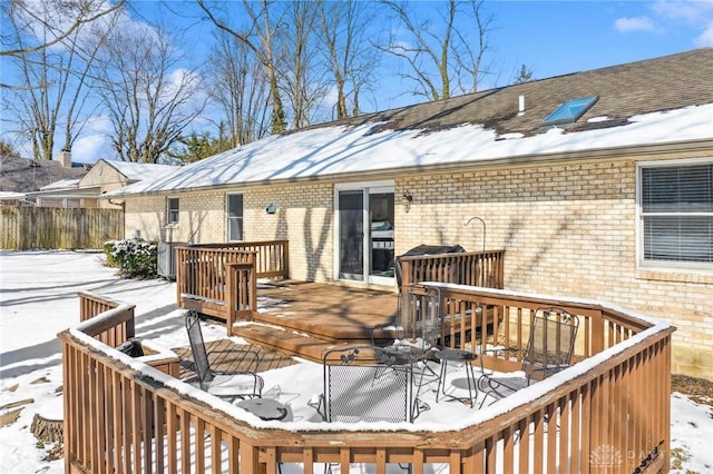 view of snow covered deck