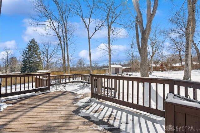 view of snow covered deck