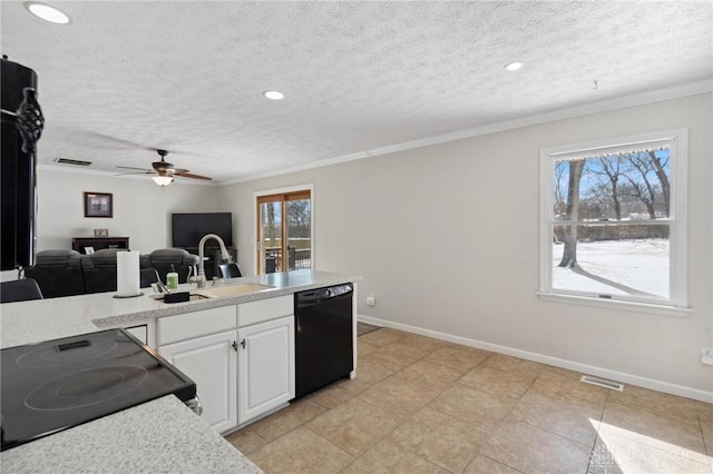 kitchen featuring white cabinets, electric stove, dishwasher, open floor plan, and light countertops