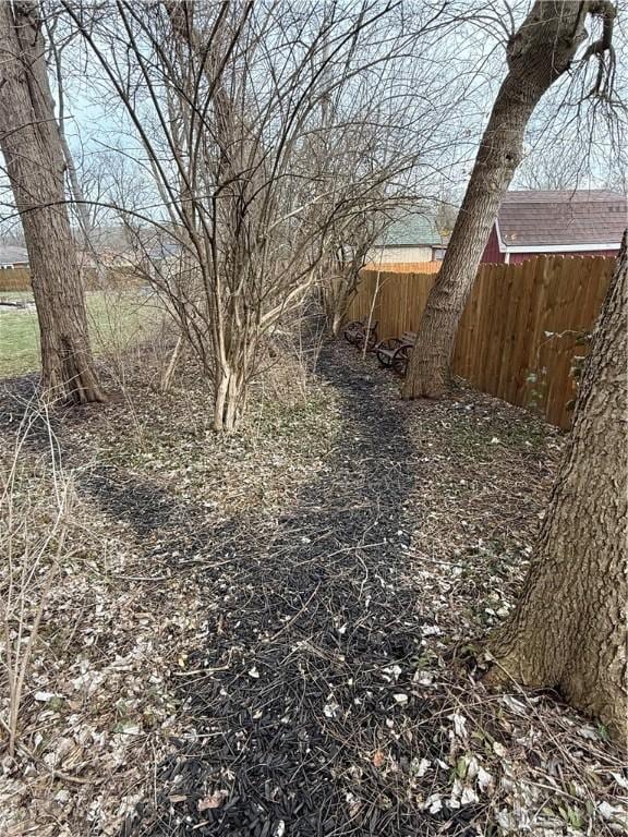 view of yard featuring fence