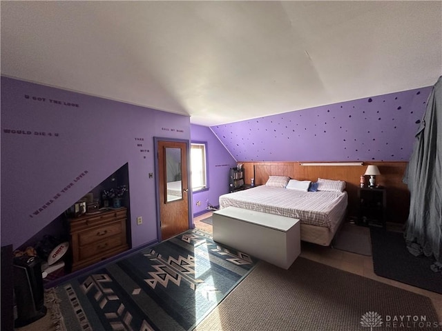 bedroom featuring vaulted ceiling