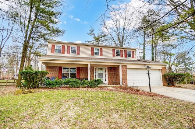 traditional home with a front yard, covered porch, and brick siding