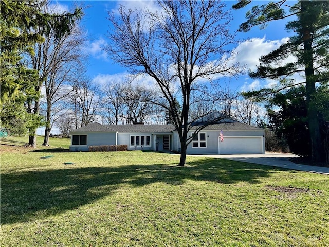 ranch-style house with an attached garage, concrete driveway, and a front lawn