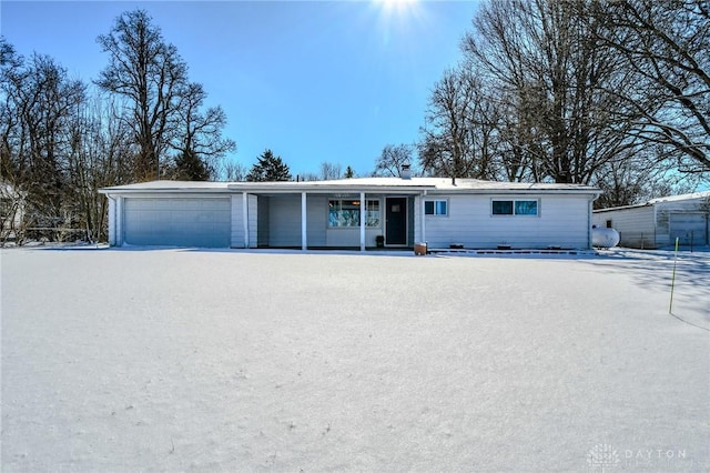 single story home featuring a garage