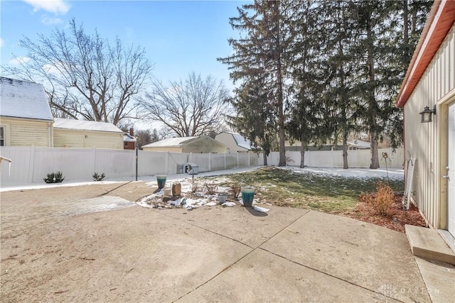 view of yard with a fenced backyard and a patio