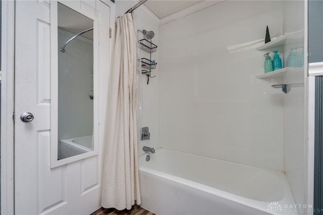 full bath with crown molding and shower / tub combo with curtain