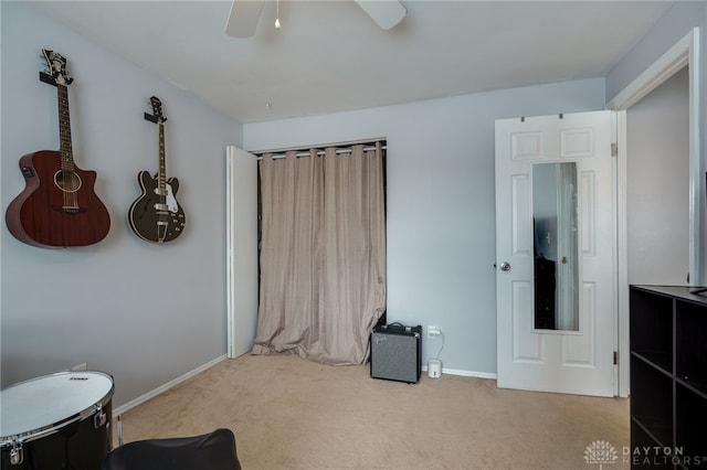 bedroom featuring a ceiling fan, baseboards, and carpet floors