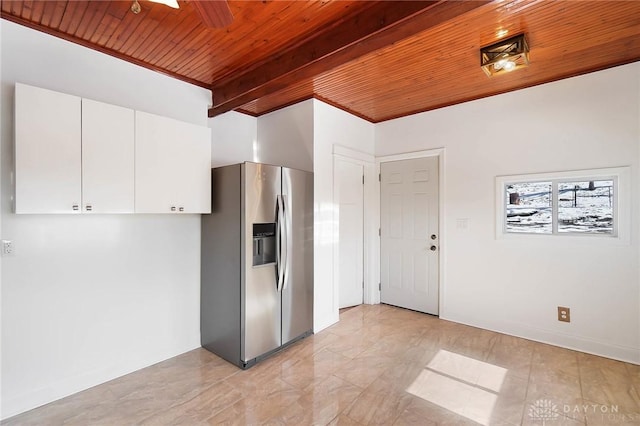 kitchen with wood ceiling, beamed ceiling, stainless steel refrigerator with ice dispenser, and white cabinetry