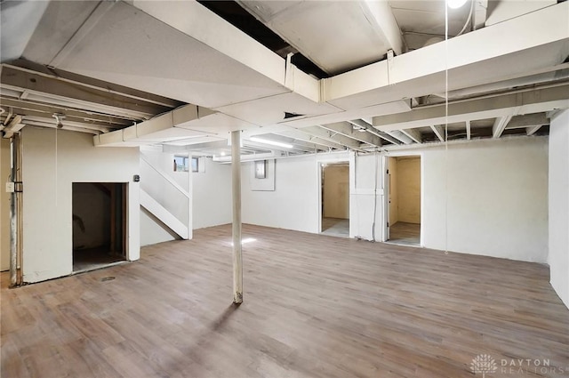 basement with wood finished floors