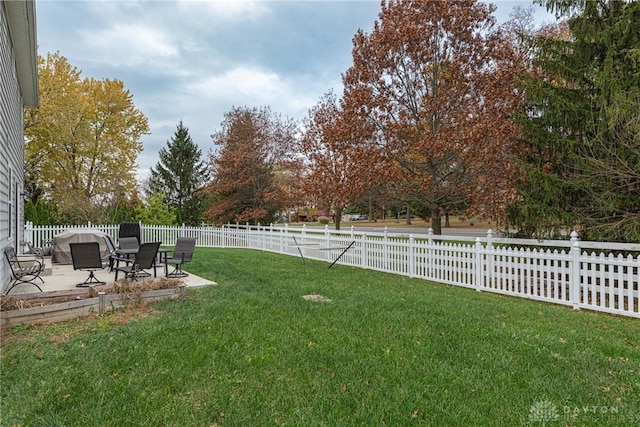 view of yard featuring a patio and a fenced backyard