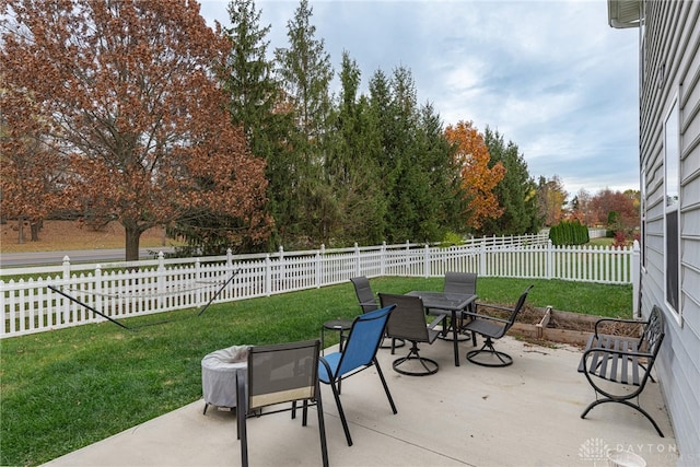 view of patio / terrace with outdoor dining area and a fenced backyard