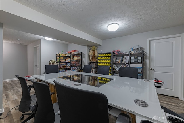 office area featuring a textured ceiling and wood finished floors