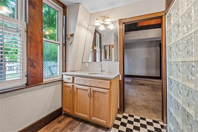 310 E Maple Ave, Miamisburg, OH 45342 - bathroom with vanity, tile patterned floors, and baseboards