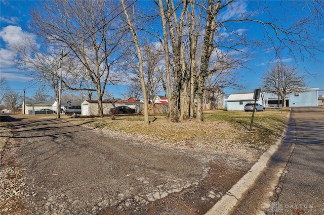 view of street featuring curbs