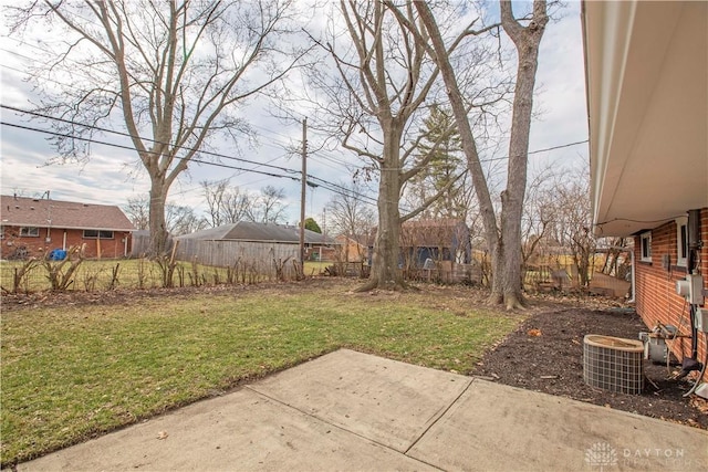 view of yard with a patio area and central AC