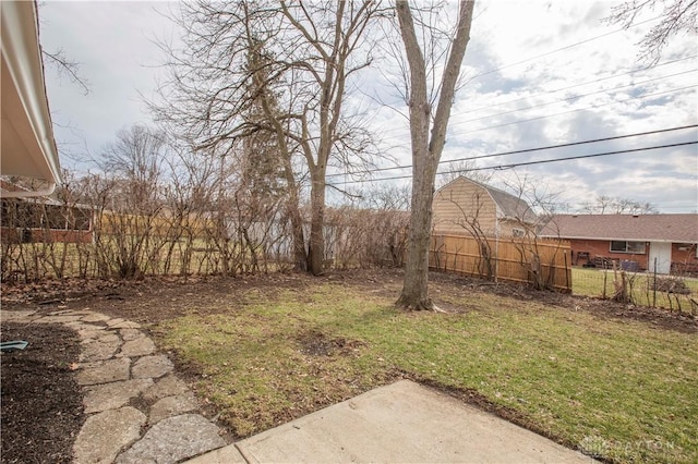 view of yard featuring fence