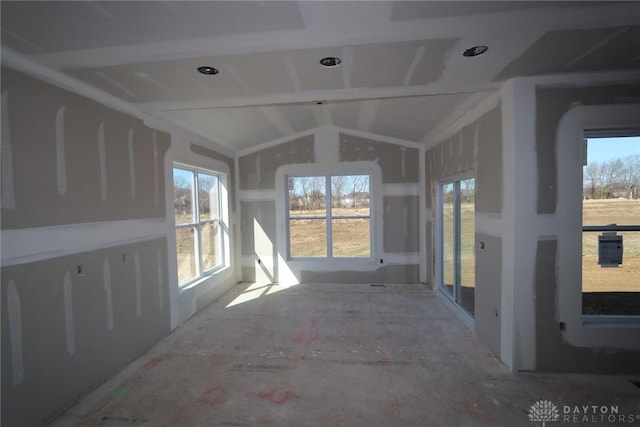 unfurnished sunroom featuring a healthy amount of sunlight