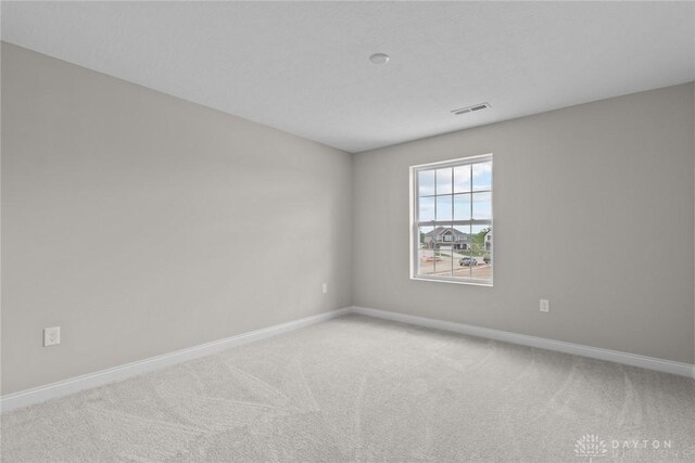 2881 Sky Crossing Dr Unit 55, Beavercreek, OH 45434 - carpeted spare room with baseboards
