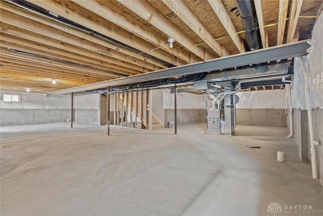 2881 Sky Crossing Dr Unit 55, Beavercreek, OH 45434 - basement featuring stairway and heating unit