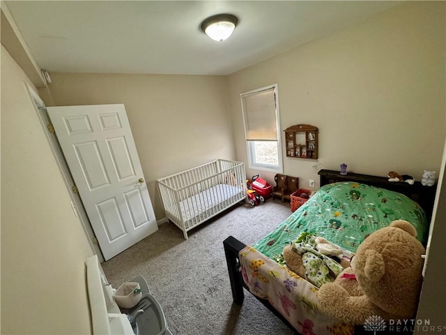 bedroom featuring carpet