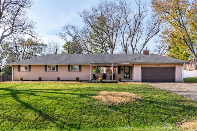 ranch-style house with driveway, a garage, fence, and a front lawn