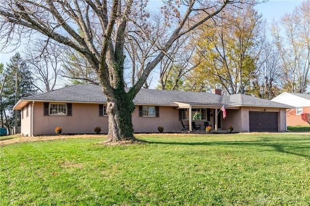 ranch-style home with a garage, a chimney, and a front yard