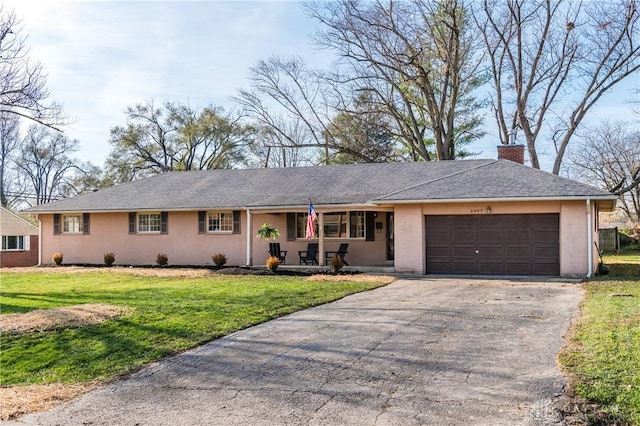 single story home featuring a chimney, a porch, a front yard, a garage, and driveway