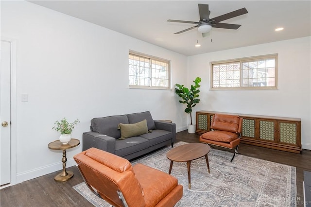 living room featuring a ceiling fan, recessed lighting, light wood-style flooring, and baseboards