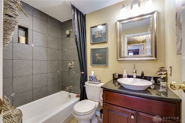 full bath featuring shower / tub combo, vanity, and toilet