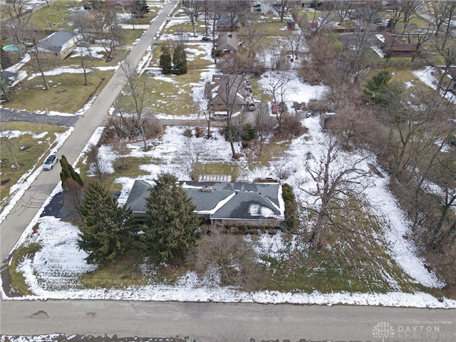 snowy aerial view featuring a residential view