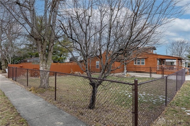 view of home's exterior featuring a fenced front yard