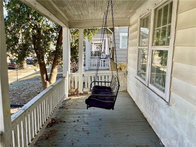 wooden deck with a porch