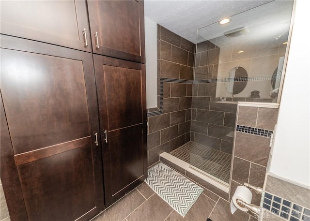 full bath with recessed lighting, walk in shower, and tile patterned floors