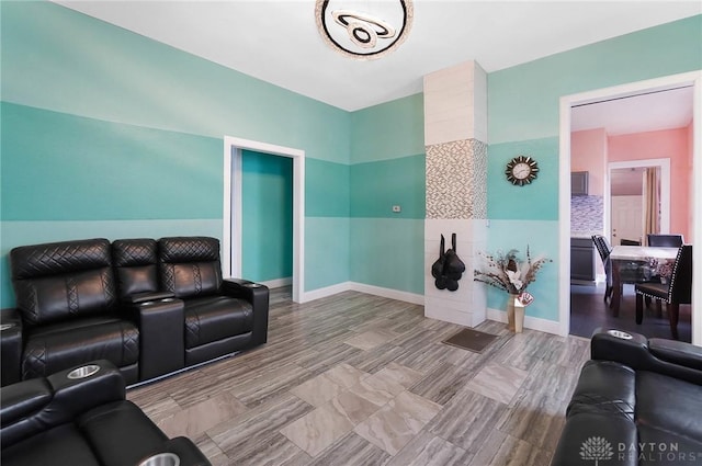 living room featuring baseboards