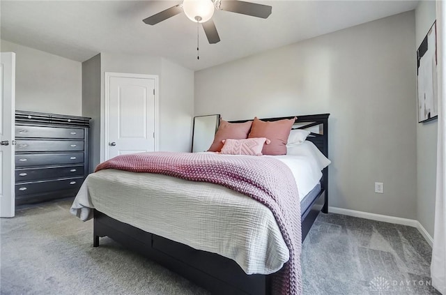 bedroom featuring light carpet, ceiling fan, and baseboards