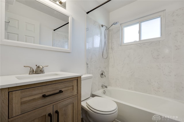 full bath featuring shower / bath combination, vanity, and toilet