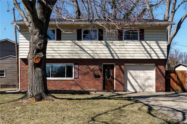 view of front of house with brick siding, an attached garage, fence, driveway, and a front lawn