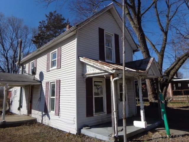 view of home's exterior with covered porch