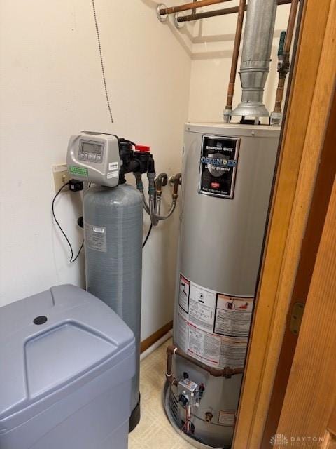 utility room with gas water heater