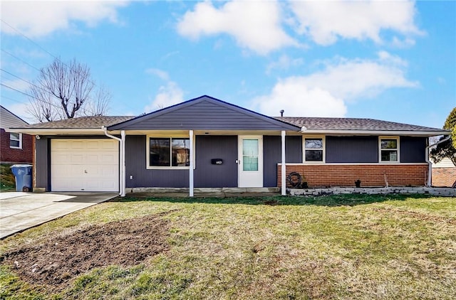 ranch-style house with a front yard, concrete driveway, brick siding, and an attached garage