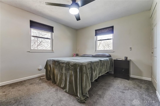 bedroom featuring carpet flooring, ceiling fan, a textured ceiling, and baseboards