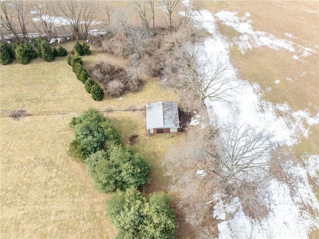 birds eye view of property with a rural view