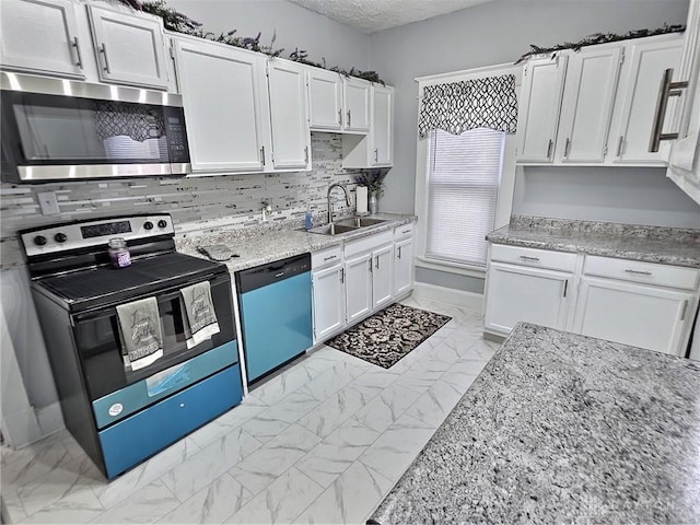 kitchen featuring dishwashing machine, electric range, a sink, marble finish floor, and stainless steel microwave